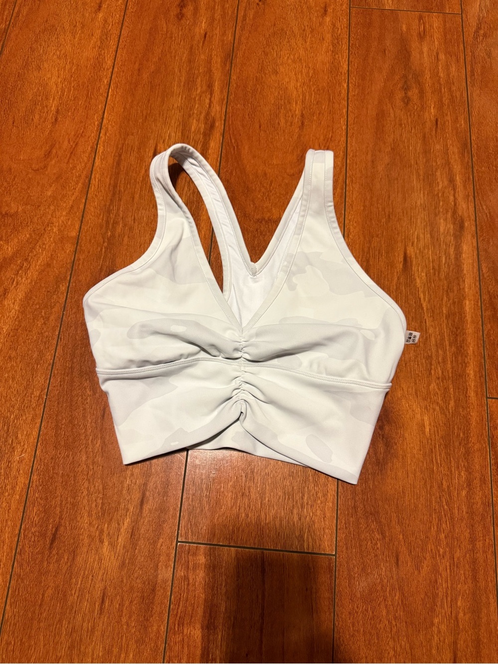 ALO Yoga White Ruched V‑Neck Sports Bralette